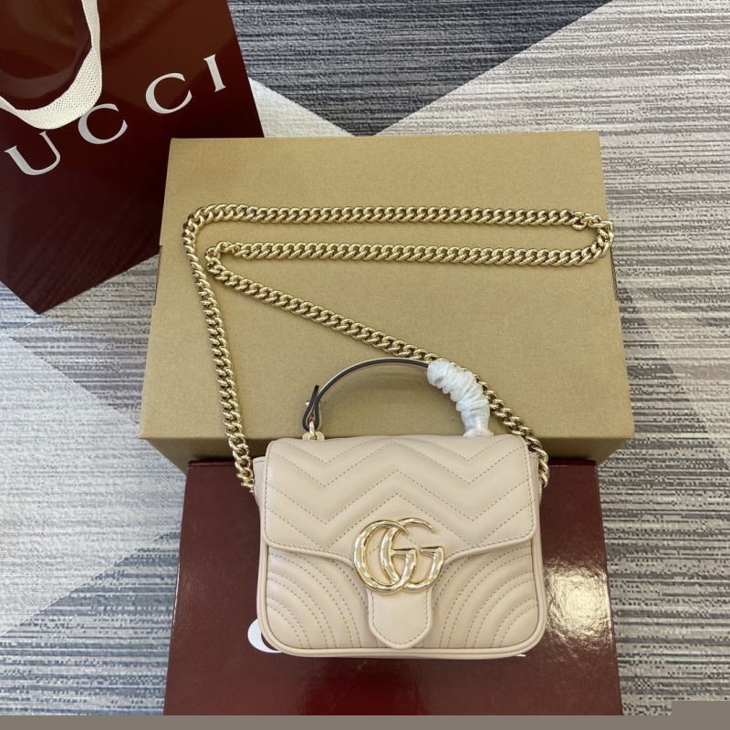 G*u*i top handle bags